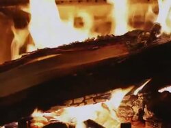  MS TU TD Logs burning in fireplace / Lamy, New Mexico, USA Stock Footage
