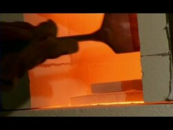 CU Metal blocks being placed in furnace, London, England Stock Footage