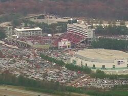 WS AERIAL View of Carter Finley Stadium - pre game with car parking area / North Carolina, United States Stock Footage
