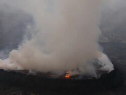 WS Shot of Smoke rises from lava lake in Nyiragongo crater / Goma, Virunga National Park, Democratic Republic of the Congo Stock Footage
