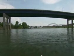 WS Boat passing below harnando de soto bridge / Memphis, Tennessee, United States Stock Footage