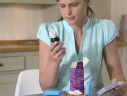 Woman looking at medicines Stock Footage