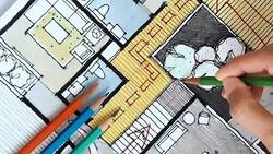 Designerï¿½s hand working with home floor plan Stock Footage