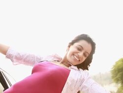 Woman watching from window of a car  Stock Footage