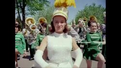 MS Performers marching in parade on street during carnival / United States Stock Footage