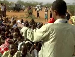 UN officer with loudspeaker Stock Footage