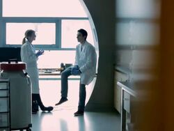 MS PAN Lab technicians discussing at window Vancouver mountains in Cancer research  Healthcare medicine  Industry DNA sequencing Laboratory / Vancouver, BC, Canada    Stock Footage