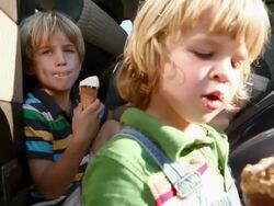 Brothers eating ice cream cones Stock Footage