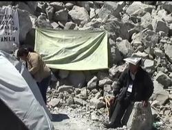 The tension is building for 33 trapped Chilean miners and their families.  With all eyes on Chile's effort to make sure that all of the miners are soon lifted to safety, the miners' physical and mental health is being fastidiously monitored. News Clip