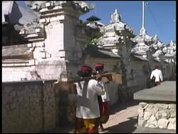 Men Carrying Drum into Buddhist Temple Stock Footage