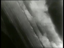 B/W 1965 Soviet rocket point of view ascending into clouds over land / SOUND Stock Footage