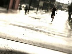 Male Athlete in Rain Stock Footage