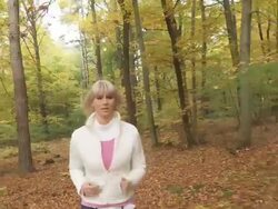 HD STEADY SHOT: Young Woman Jogging In Autumn Forest Stock Footage