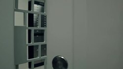 Bank.Security opening the door leading into room with deposit boxes Stock Footage