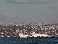 PASSENGER FERRIES AND BOSPHORUS SUSPENSION BRIDGE Stock Footage