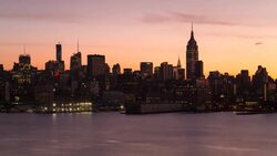 Manhattan, view of the Empire State Building and Midtown Manhattan across the Hudson River, New York, United States of America - Time lapse Stock Footage