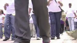 VOICED : Venezolanos divididos en dia del trabajador News Clip