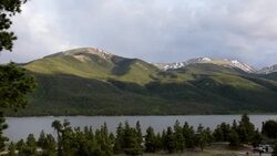 Twin Lakes Colorado 14ers Mount Elbert Peaks With Sunshine time lapse going up the mountain side Stock Footage
