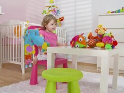 HD CRANE: Adorable Baby Girl Playing With Toys Stock Footage