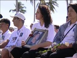Japanese at memorial service News Clip