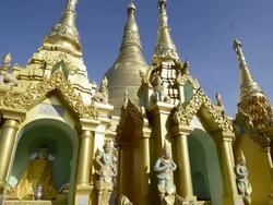 MS TD LA Shot of filigree golden pagoda peaks and shrines with nat figures in shwedagon pagoda / Yangon, Yangon Division, Myanmar Stock Footage