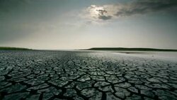 Dry, cracked earth and clouds Stock Footage
