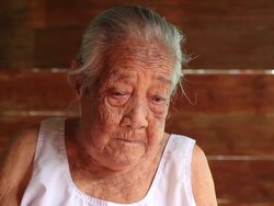 Asian senior woman wiping tears Stock Footage