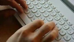 Hand typing a laptop computer Stock Footage