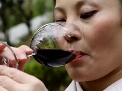 Japanese Woman Drinking Red Wine Stock Footage