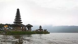 Pura Ulun Danu temple on a quiet foggy morning Stock Footage