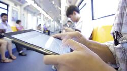 Close-up of Human Hand typing virtual keyboard on the train Stock Footage