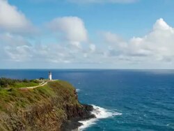WS T/L ZI Kilauea Lighthouse and crushing waves / Kilauea, Kauai, Hawaii, United States Stock Footage