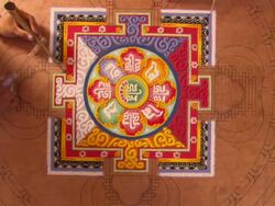WS ZI Monks continueing strenuous process of filling in mandala with color sand  / Kathmandu, Central, Nepal Stock Footage