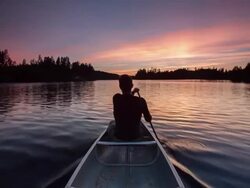 Canoeing at Sunset Stock Footage