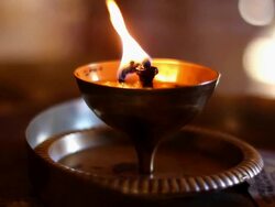 Oil lamp burning in hindu temple, India Stock Footage