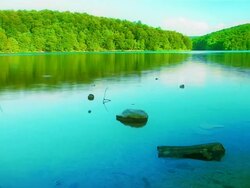 Summer lake and green hills Stock Footage