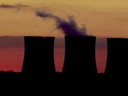 WS PAN Cooling towers of power station against pink and purple sky / Dicot, Oxfordshire, England Stock Footage