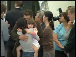 Two American journalists freed by North Korea have returned home to the United States on a flight with former President Bill Clinton. Euna Lee and Laura Ling spent more than four months detained in North Korea. News Clip