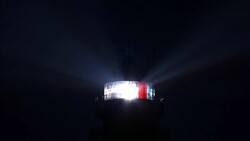 CU, Germany, Schleswig-Holstein, Westerhever lighthouse beacon at night Stock Footage