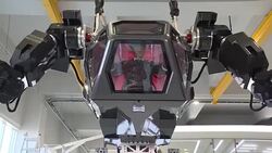 CLEAN : Avatar style S. Korean manned robot takes first baby steps News Clip