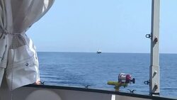 CLEAN : FILE: Migrant aid ship bails out anti migrant vessel in Med News Clip