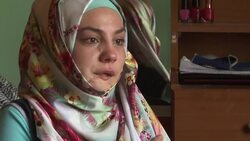 Scars of war line Syrian woman's face News Clip