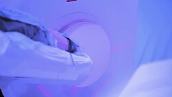 Patient being examined by MRI machine at Hospital Stock Footage