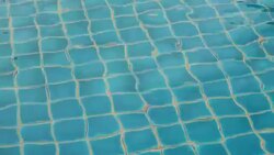Refraction of sunlight in swimming pool water Stock Footage