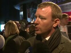 INTERVIEW: Guy Ritchie on the pressure of the 2nd film, Robert Downey Jr. dressing in drag, a 3rd film, Stephen Fry nude at the Sherlock Holmes: A Game Of Shadows: European Premiere at Empire Leicester Square on December 08, 2011 in London, England Stock Footage