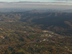 WS AERIAL View of town in front of mountain / North Carolina, United States Stock Footage