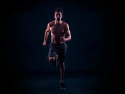 Athletic Male Running In Place Slow-Motion Stock Footage