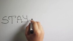 Hand writing title 'STAY STRONG'on white board Stock Footage