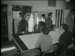 Americans vote in the 1960 Presidential Election. News Clip