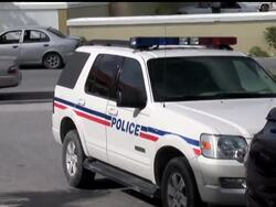 Rescuers searched by sea and air for nearly 70 Haitians after an overloaded sailboat ran aground and capsized in reef-studded waters off the Turks and Caicos Islands, killing at least 15 migrants News Clip